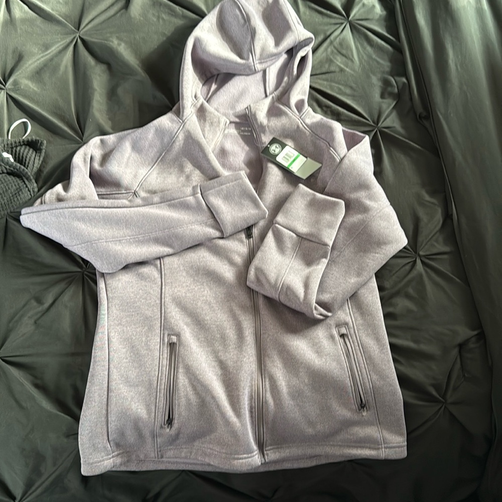 Under armor size large women’s zip up never worn tags on